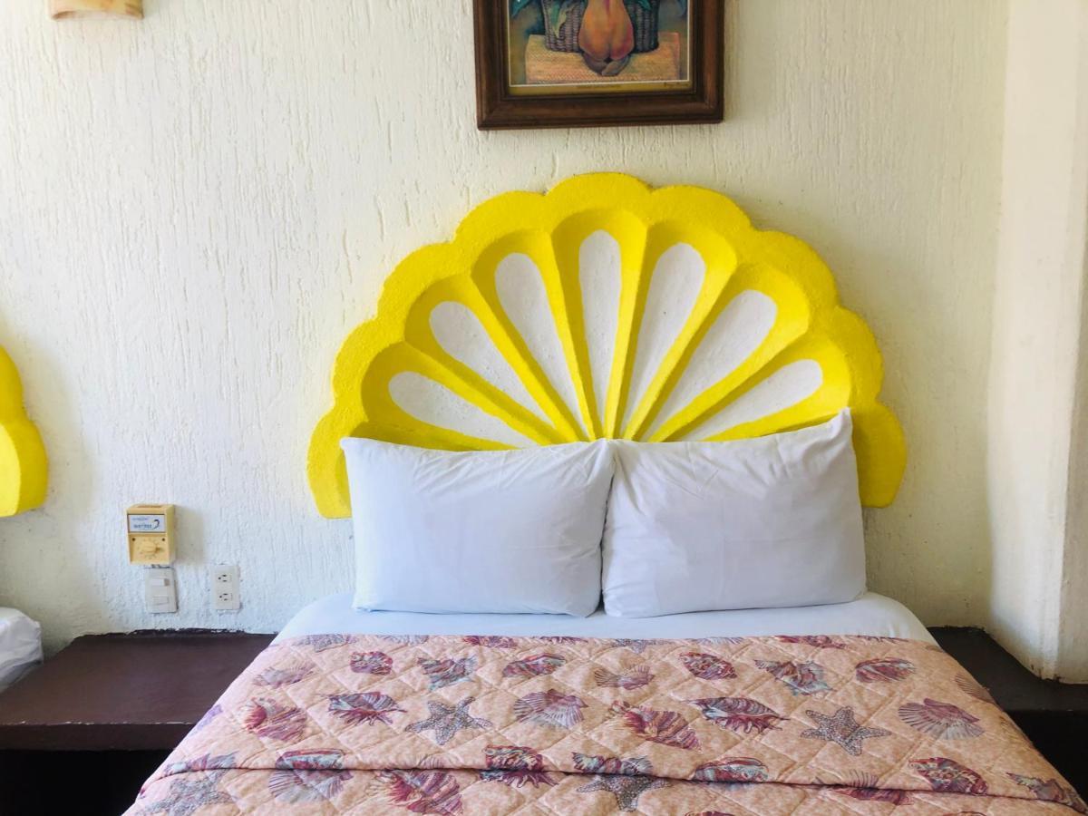 Hotel Playa Santa Cruz By Rotamundos Huatulco Eksteriør billede